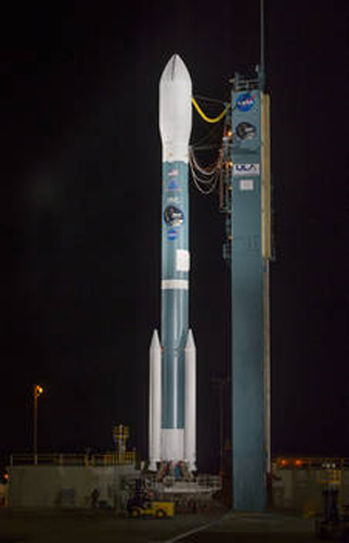 NASA's Soil Moisture Active Passive (SMAP) observatory, on a United Launch Alliance Delta II rocket,: is seen after the mobile service tower was rolled back Friday, January 30, 2015 at Space Launch Complex 2, Vandenberg Air Force Base, California. Photograph courtesy of NASA by Bill Ingalls